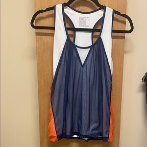 Lucky in Love Women's White, Navy, and Orange Tank.Slight discoloring under arms